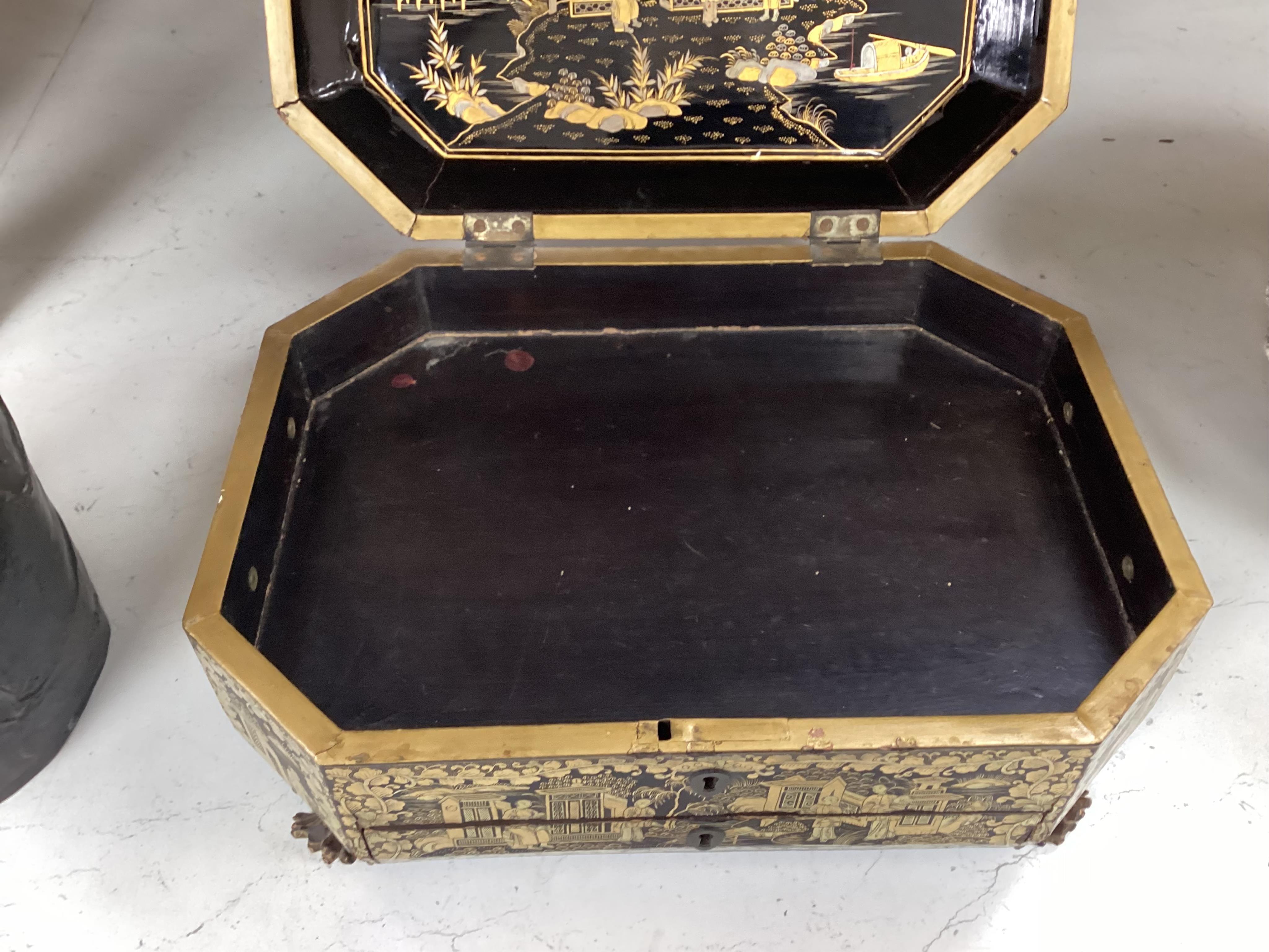A Chinese export octagonal lacquered work box with fitted interior, 35cm wide
